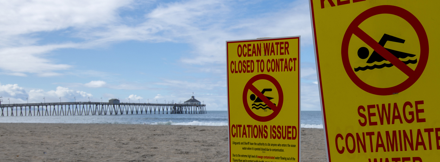 no swimming signs posted at the beach